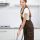 smiling-woman-cleaning-kitchen-with-vacuum-cleaner-2021-09-01-09-41-43-utc.jpg